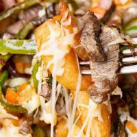 Loaded Cheese Steak · Onions, peppers, mushroom, mozzarella cheese.