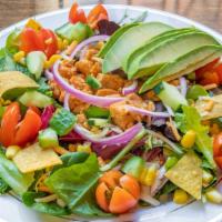 Santa Fe Salad · Cajun chicken, mix greens, avocado, corn, mix cheddar and jack cheese, tomato, red onions, a...