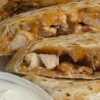 Western Chicken Quesadillas · char-broiled bbq chicken breast with applewood smoked bacon, onion rings and cheddar jack ch...
