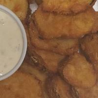 Deep Fried Pickles · Hand-breaded dill pickle chips served with salsa ranch dressing