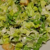 Caesar Salad · hearts of romaine tossed with shredded parmesan, seasoned croutons and caesar dressing