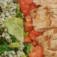 Chicken Cobb Salad · mixed greens with tomatoes, chopped bacon, crumbled bleu cheese, sliced egg and chicken. ser...