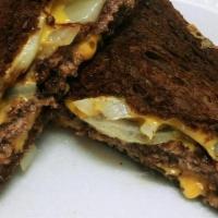Penfield Special · patty melt style grilled cheeseburger on marble rye with sauteed onions served with choice o...