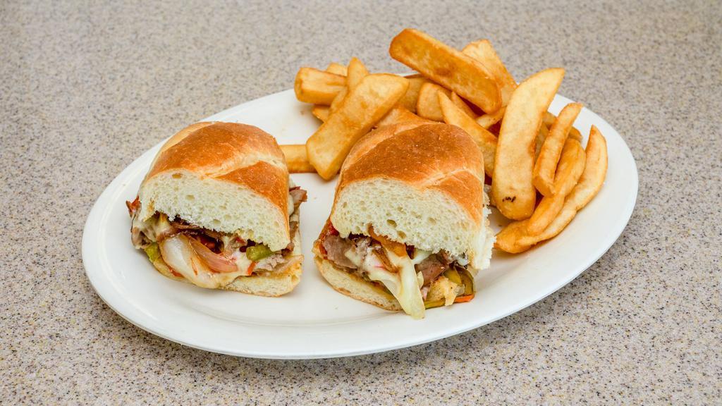 Philly Cheesesteak · thinly sliced steak with sauteed peppers & onions and melted provolone on a grilled hoagie roll served with your choice of side