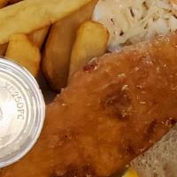 Haddock Sandwich · Beer-Battered haddock sandwich on a grilled hard roll with tartar and coleslaw and served wi...