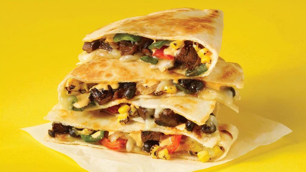 The O.G. Quesadilla - Choice Of Grilled Chicken, Steak Or Vegetarian (V) · That old school flava. Grilled chicken, carne asada steak or . vegetarian, flour tortilla, chipotle crema, jack cheese, black beans, roasted corn, sautéed peppers & onions.