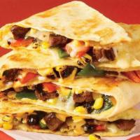 Spicy Steakhouse Quesadilla · Carne asada steak, chipotle queso, black beans, jack cheese, sautéed peppers & onions, and r...