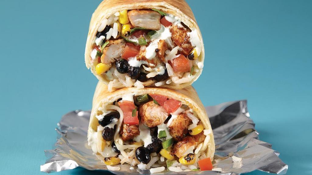 The Spicy Chicken Ranch · Spicy Grilled chicken, jalapeño ranch, black beans, white rice, roasted corn, pico de gallo & jack cheese in a jalapeño tortilla. That’s hot.