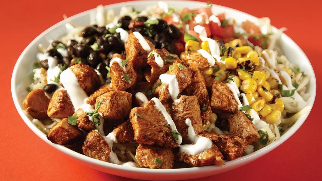 The Spicy Chicken Ranch Bowl · Grilled chicken, jalapeño ranch, black beans, white rice, roasted corn, pico de gallo & jack cheese. That’s hot.