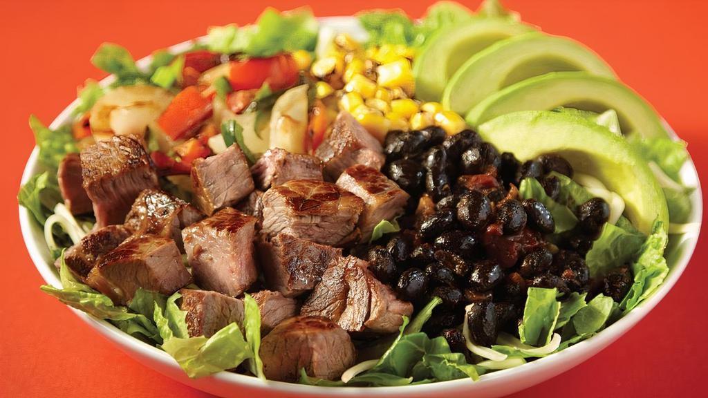 The O.G. Salad - Choice Of Grilled Chicken, Steak Or Vegetarian (V) · That old school flava. Grilled chicken or carne asada steak, fresh avocado, mixed greens, jack cheese, black beans, roasted corn, pico de gallo.. Recommended Creamy Chipotle Dressing