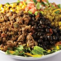 The Tex-Mex Flex Salad · Ground beef, mixed greens, black beans, roasted corn, pico de gallo, pickled jalapenos & che...