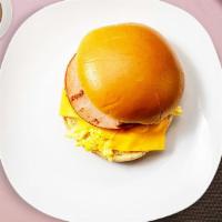 Ham You Seen Sandwich · Ham, scrambled egg, and cheddar cheese served on bread.