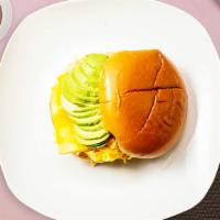 Visions Of Avocado Sandwich · Avocado, scrambled egg, and cheddar cheese served on bread.