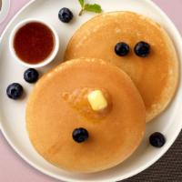 You'Re Blueberry Beautiful Pancakes · Fluffy pancakes cooked with care and love served with blueberries, butter and maple syrup. S...