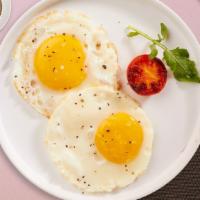 Fried Egg Attraction · Get a pair of lightly fried eggs!