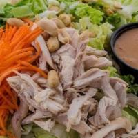 Mini Chinese Chopped Salad With Grilled Chicken · Napa cabbage, snow peas, grated carrot, dry roasted peanuts, red chili peanut dressing.