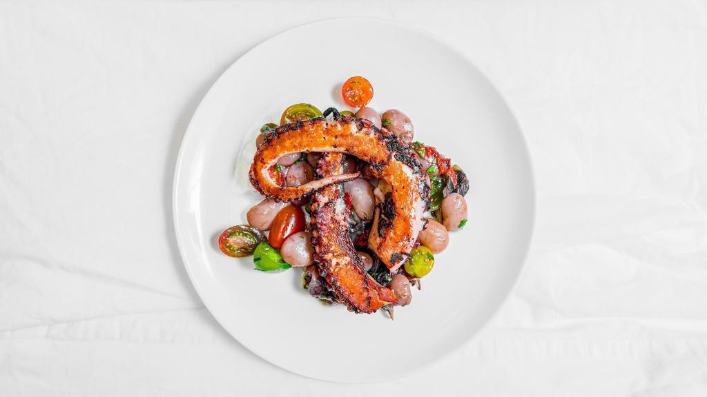 Roasted Octopus Delivery · gigandes beans, roasted pepper, tomato, olives, garlic confit, radicchio