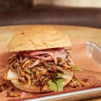 Pulled Mushroom Sandwich · Dairy Free, Vegan. Carolina style pulled oyster mushrooms, cayenne BBQ sauce, shaved Asian p...