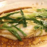 Steamed Fillet Of Sole · Ginger, scallion, and soy sauce.