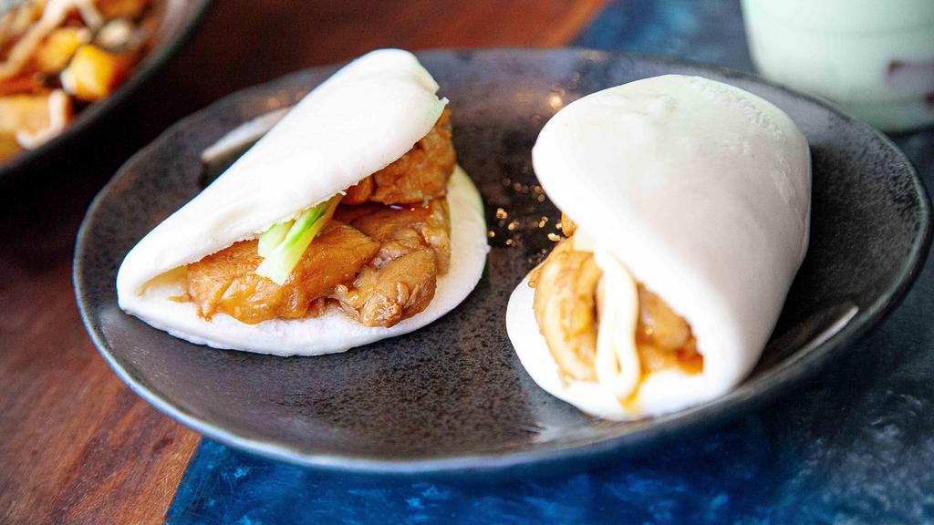 Chashu Bun (2) · Steamed bun with cucumber, sweet chashu sauce, Japanese mayo, with choice of chicken or pork chashu.