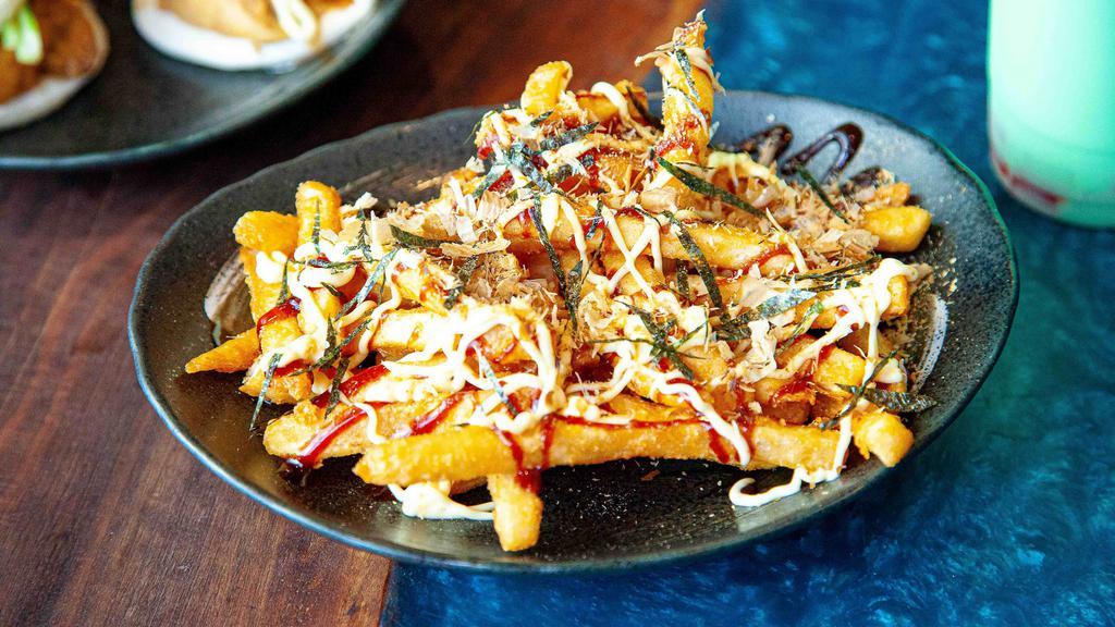 Oko Fries · Fries served with okonomiyaki sauce, kewpie mayo, bonito flakes and shredded seaweed.