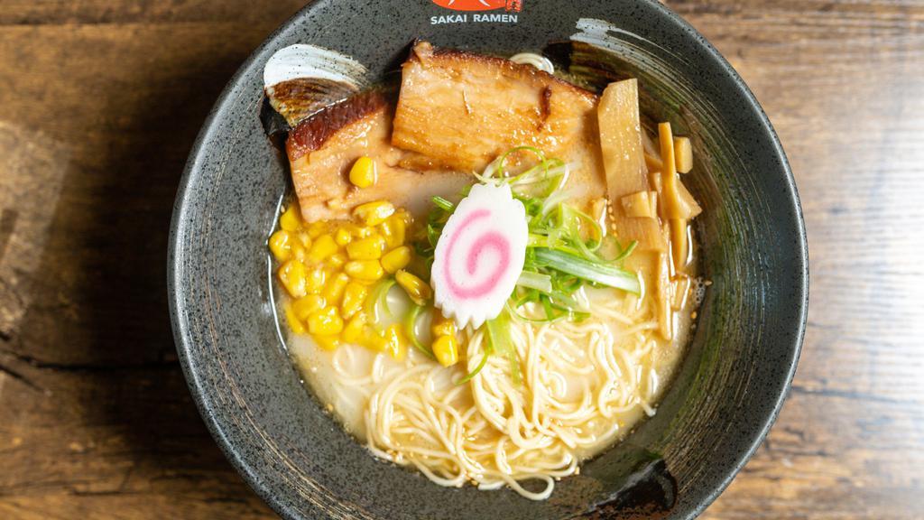 Shio Ramen · Salt based pork
 broth, with two pieces pork chashu, fishcake, scallion, corn, bamboo shoots and sesame seeds. Make it spicy for an additional charge.