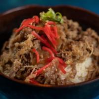 Gyu Don · Donburi rice bowls steamed rice topped with thinly sliced beef and onion, simmered in a swee...