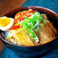 Chashu Don · Roasted pork or chicken chashu over white rice with scallions, pickled ginger, half egg topp...