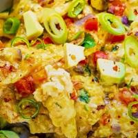 Mexican Eggs  · Scrambled eggs with jalapeño pepper, tomatoes and onions with home fires, baked good of the ...