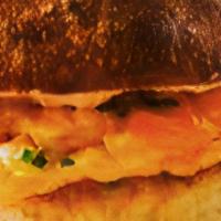 Scrambled Eggs Sandwich  · Soft scrambled eggs and american cheese on a toasted buttered bun. Served with home fries an...