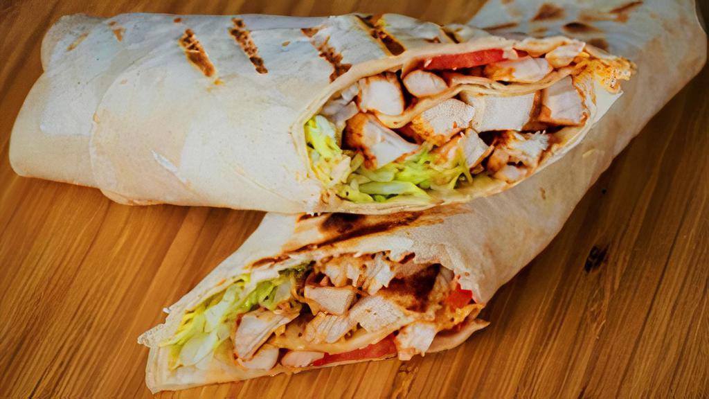 Chicken Caesar · Romaine lettuce, grilled chicken, sliced egg, parmesan cheese, croutons and Caesar creamy dressing a flour tortilla.