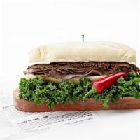 Brisket Sandwich · All Sandwiches served on baguette w pickles & cole slaw choice of wrap, W/W Wrap & W/W bague...