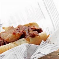 Pastrami Dog · GRILLED BEEF  HOT DOG WITH. PASTRAMI,CARMELIZED  ONIONS . IN BBQ SAUCE. SERVEF ON A BUN. (HA...