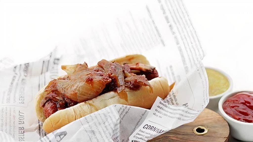 Pastrami Dog · GRILLED BEEF  HOT DOG WITH. PASTRAMI,CARMELIZED  ONIONS . IN BBQ SAUCE. SERVEF ON A BUN. (HAMOTZI)