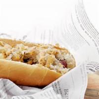 Rubin Dog · GRILLED CLASSIC BEEF  HOT DOG. TOPPED WITH. SAUERKRAUT AND RUSSIAN DRESSING