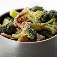 Beef & Broccoli · Sliced Beef with Broccoli in a Brown Sauce.