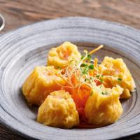 Shrimp Dumplings · Your call, steamed or fried. Shrimp dumplings served with soy vinaigrette dip or sweet chili...