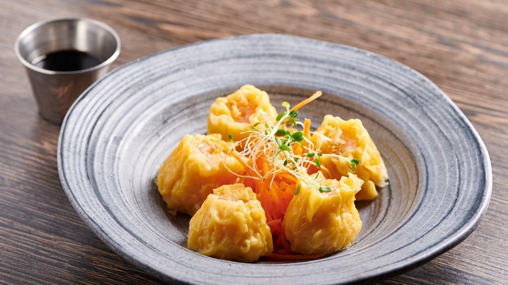 Shrimp Dumplings · Your call, steamed or fried. Shrimp dumplings served with soy vinaigrette dip or sweet chili dip.