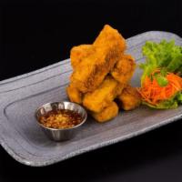 Fried Tofu · Comes with crushed peanuts in our special sweet and chili dipping sauce.
