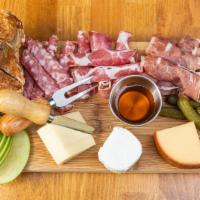Strabo Charcuterie Imports (1 Oz. Slices Of Each) · a selection of 3 imported cured meats served with toasted multi-grain bread and cornichons.