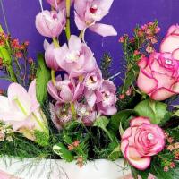 Orchids · Orchids and Roses with lilies and filler flowers