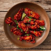 Hot Chilli Wings · Our delicious wings covered in a flavorful sweet chili sauce.