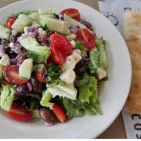 Greek Salad · seasonal mixed greens tossed with cherry tomato halves, refreshing cucumber dices, crunchy r...
