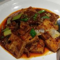 Braised Tofu With Pork · A traditional home dish.  Little spicy.