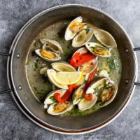 Clams Bulhao Pato · Fresh local clams steamed in Portuguese olive oil, garlic, white wine and fresh cilantro.