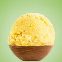 Pineapple · Pineapple flaovred ice cream with crushed pineapple pieces.