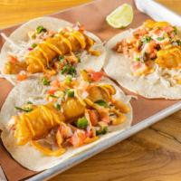 Fish Tacos  · 3 Beer battered Cod tocos, flour tortilla, cabbage, pico de gallo, spicy mayo