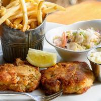 Maryland Crab Cakes · Classic jumbo lump crab cakes, french fries, coleslaw, tartar sauce.