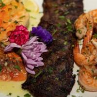 Capicu Trio · Lobster tail, skirt steak, and grilled shrimp.