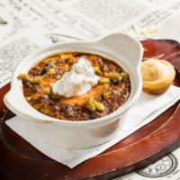 Firehouse Chili · Melted cheddar, sour cream, jalapenos side of homemade corn bread.